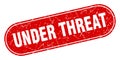 under threat sign. under threat grunge stamp. Royalty Free Stock Photo