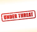 Under threat text stamp Royalty Free Stock Photo