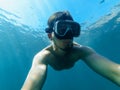 Under water the diver man in the mask is snorkeling Royalty Free Stock Photo