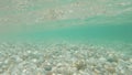 Under water surface and sandy seabed in the Mediterranean sea, natural scene