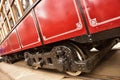 Undercarriage red vintage tram, steel wheels tram Royalty Free Stock Photo