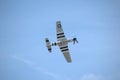 Undercarriage view of a North American P-51 Mustang WWII aircraft flying at Springbank Airport