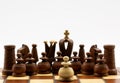 Underdog Concept: One White Pawn Standing Against Black Chess Pieces Royalty Free Stock Photo