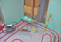Underfloor heating installation. Close up on water floor heating Royalty Free Stock Photo