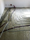 Underfloor heating installation. Close up on water floor heating system interior. plumbing pipes. Individual Heating. Royalty Free Stock Photo