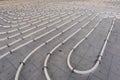 Underfloor heating system installation. Close up on water floor heating system interior of a new indoor swimming pool