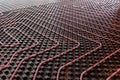 Underfloor heating system installation. Close up on water floor heating system interior of a new residential building. Royalty Free Stock Photo