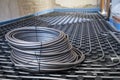 Underfloor heating system pipes on insulation. Radiant floor. Royalty Free Stock Photo