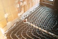 Underfloor heating system with pipes, tubes and heat pump