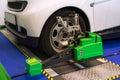 Undergoing auto wheel alignment on technical service
