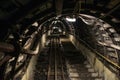 Underground black coal mine with rail tracks Royalty Free Stock Photo