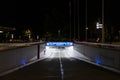 Underground car park entrance with german inscriptions in Luzern. Night view, illuminated by lights. Street signs on the ground Royalty Free Stock Photo