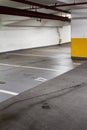 Empty underground parkade with footprint