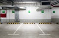 Underground car parking, empty light parking lot indoor