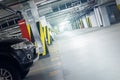 Underground car parking interior in basememnt floor shopping mall, office business center or residential apartment building. Royalty Free Stock Photo