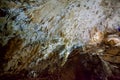 Underground cave, amazing scene , view of stalactites and stalagmite underground Royalty Free Stock Photo