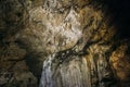 Underground cave interior, formations on ceiling Royalty Free Stock Photo