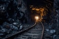 Underground coal mine with rails and trolley