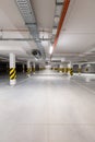 Underground empty parking garage. Modern urban space