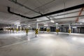 Underground empty parking garage. Modern urban space