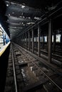 Underground Empty Subway Station Dock in New York City on line t Royalty Free Stock Photo