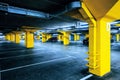 Underground garage parking lot with few cars and empty spaces Royalty Free Stock Photo
