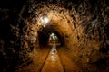 Underground mine passage with rails Royalty Free Stock Photo