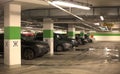 Underground parking with cars. Royalty Free Stock Photo