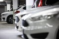 Underground parking garage with cars Royalty Free Stock Photo