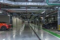 Underground parking with cars in the shopping center. Comfortable rest, shopping and entertainment. Royalty Free Stock Photo