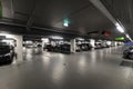 Underground parking garage with parked cars Royalty Free Stock Photo