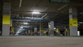 Underground parking with neon light ,fire extinguisher and pipe, Bangkok Thailand