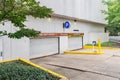 Underground parking structure with gated entrance and restricted access for cardholders only Royalty Free Stock Photo
