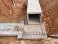 Underground precast concrete box culvert drain under construction at the construction site. Royalty Free Stock Photo