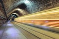 Underground railroad with moving train, transporation. Royalty Free Stock Photo