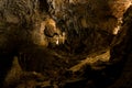 Dark and fantastic cave with stalagtite and stalagmite