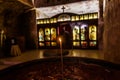 A burning candle in an Orthodox church