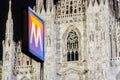 Underground subway metro tube traffic sign with Cathedral on background, in Milan, Lombardy, Italy Royalty Free Stock Photo