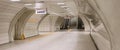 Underground subway station hallway tunnel with escalator. Abstract perspective view