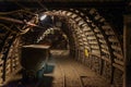 Underground train in black coal mine tunnel Royalty Free Stock Photo