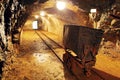 Underground train carts in gold, silver mine Royalty Free Stock Photo