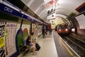 Underground train enters Piccadilly Circus