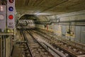 Underground tunnel for the subway leading deep down. Tube metro perspective view. Railway transport Royalty Free Stock Photo