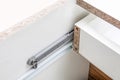 Undermount Drawer Slides - glides closeup detail - Furniture hardware Royalty Free Stock Photo