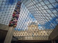 Underneath the Louvre glass pyramid. Beautiful architectural details with an abstract mixture of classical and modern architecture