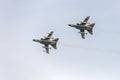 Underneath of Tornado military fighter airplanes pair flying at airshow, Linate, Italy