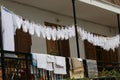 Underpants. The same white underpants hangs outside on a balcony after laundry. Identical underwear becomes dry outdoor