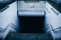 An underpass with stairs at a train station Royalty Free Stock Photo
