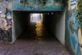 Underpass in urban city with light at the end Royalty Free Stock Photo