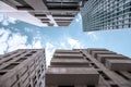 Undershot of skyscrapers with a cloudy sky background Royalty Free Stock Photo
